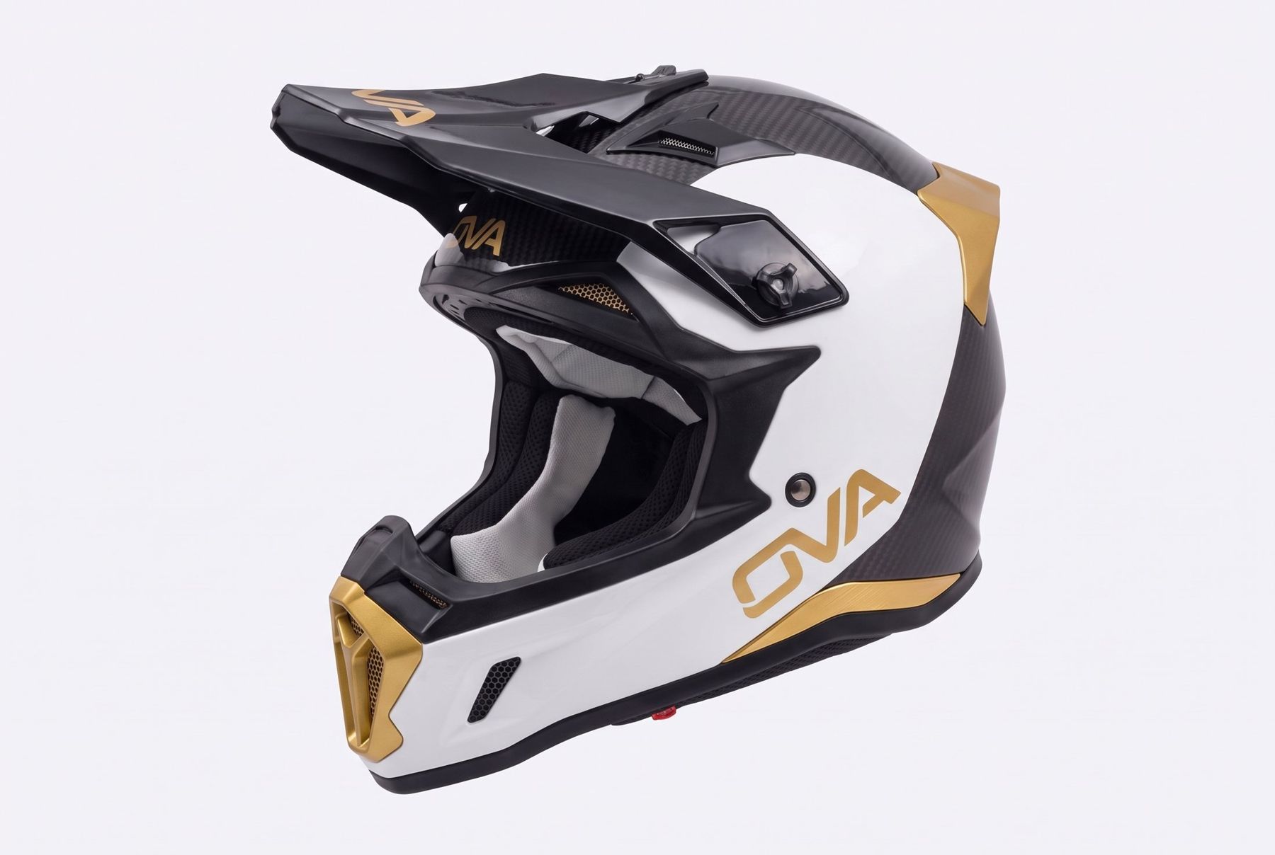 Casque cross OVA blanc, carbone et or, vue de trois quarts avant